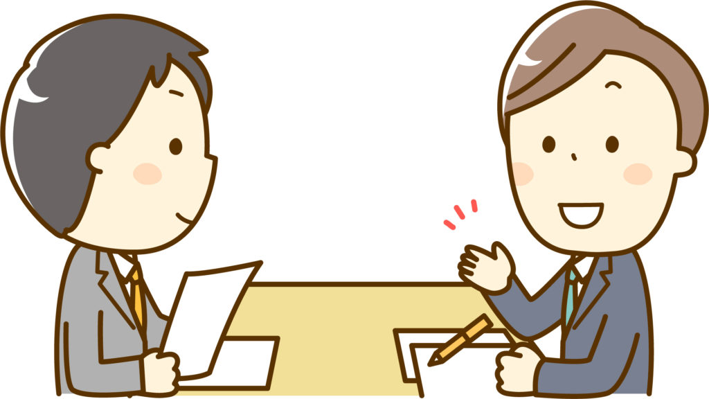 障害を持ち働くことについて議論している男性二人